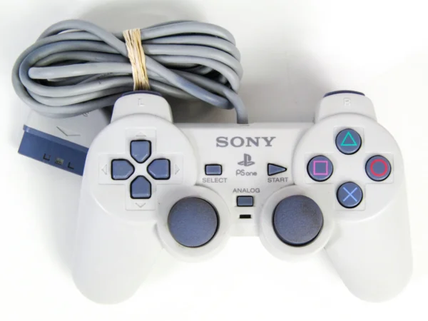 IMG_4224-2_7906e628-5edb-428f-9e6b-7cc591b7f5f2 Eredeti Sony PSone (PlayStation 1) DualShock kontroller – világosszürke (Használt)